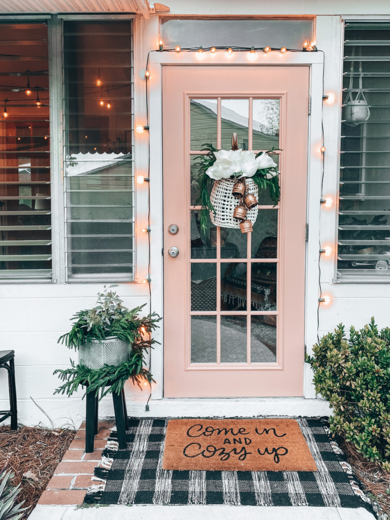 https://theblushingbungalow.com/wp-content/uploads/2020/12/christmas-front-porch-and-faux-flowers8-768x1024.jpg
