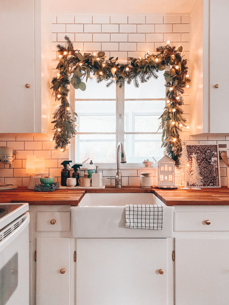 Kitchen Christmas garland over kitchen sink