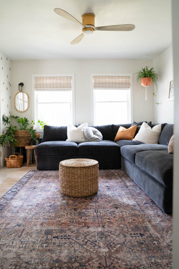 Small Cozy Living Room with Black Sofa - Blushing Bungalow | So ...