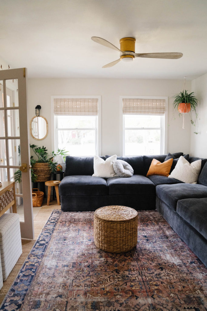 Small Cozy Living Room with Black Sofa - Blushing Bungalow | So ...