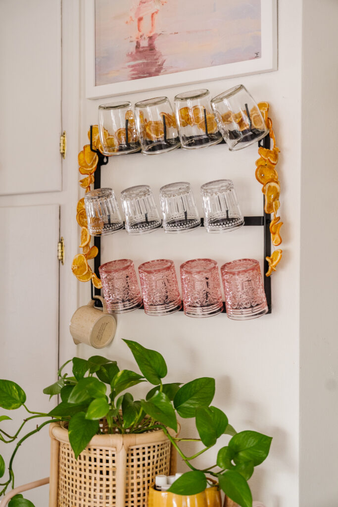 cups rack and orange slices